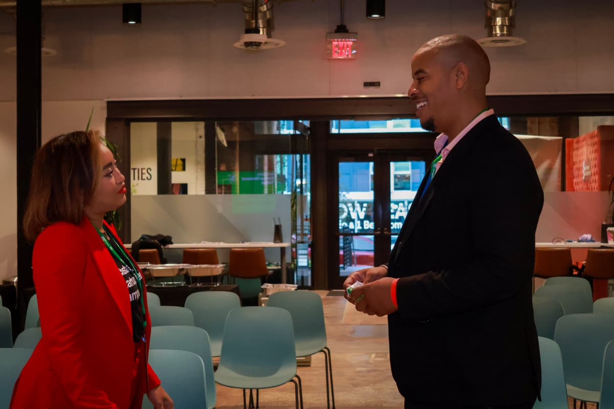 Founder pitching in front of mentors and peers.